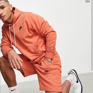 Peach colored NIKE sweat suit (shorts)